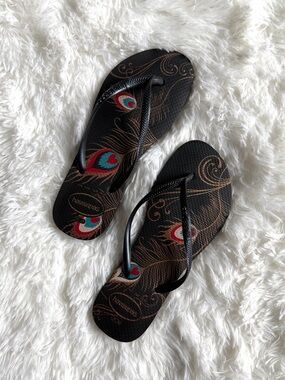 Havaianas Black Flip Flops with Peacock Feather Accent